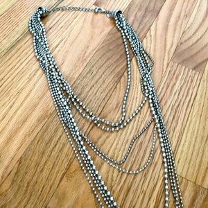 Weighty long silver necklace